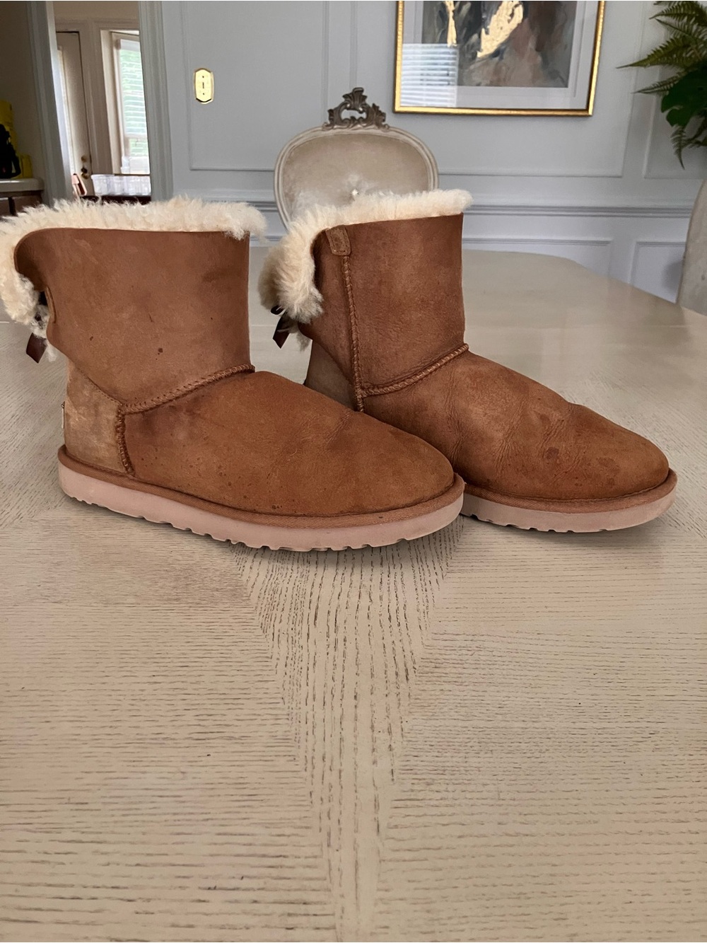 UGG Mini Bailey Chestnut Suede Shearling Boots with Bows